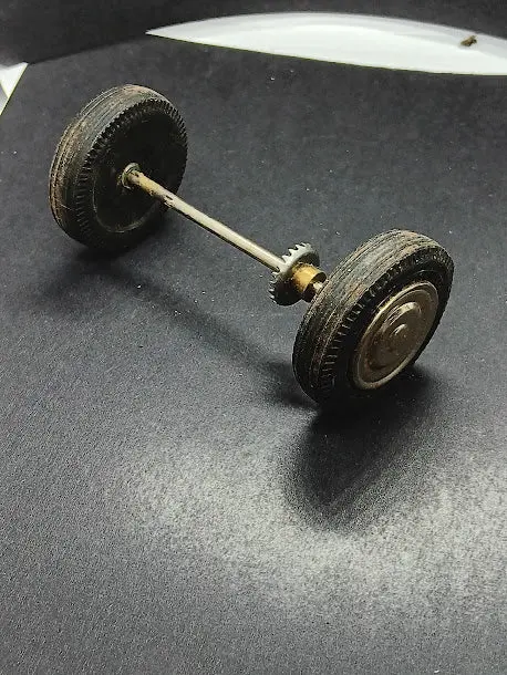 1-1/2" Wheels On 3-1/2" Axle With Drive Gear Attached. 1