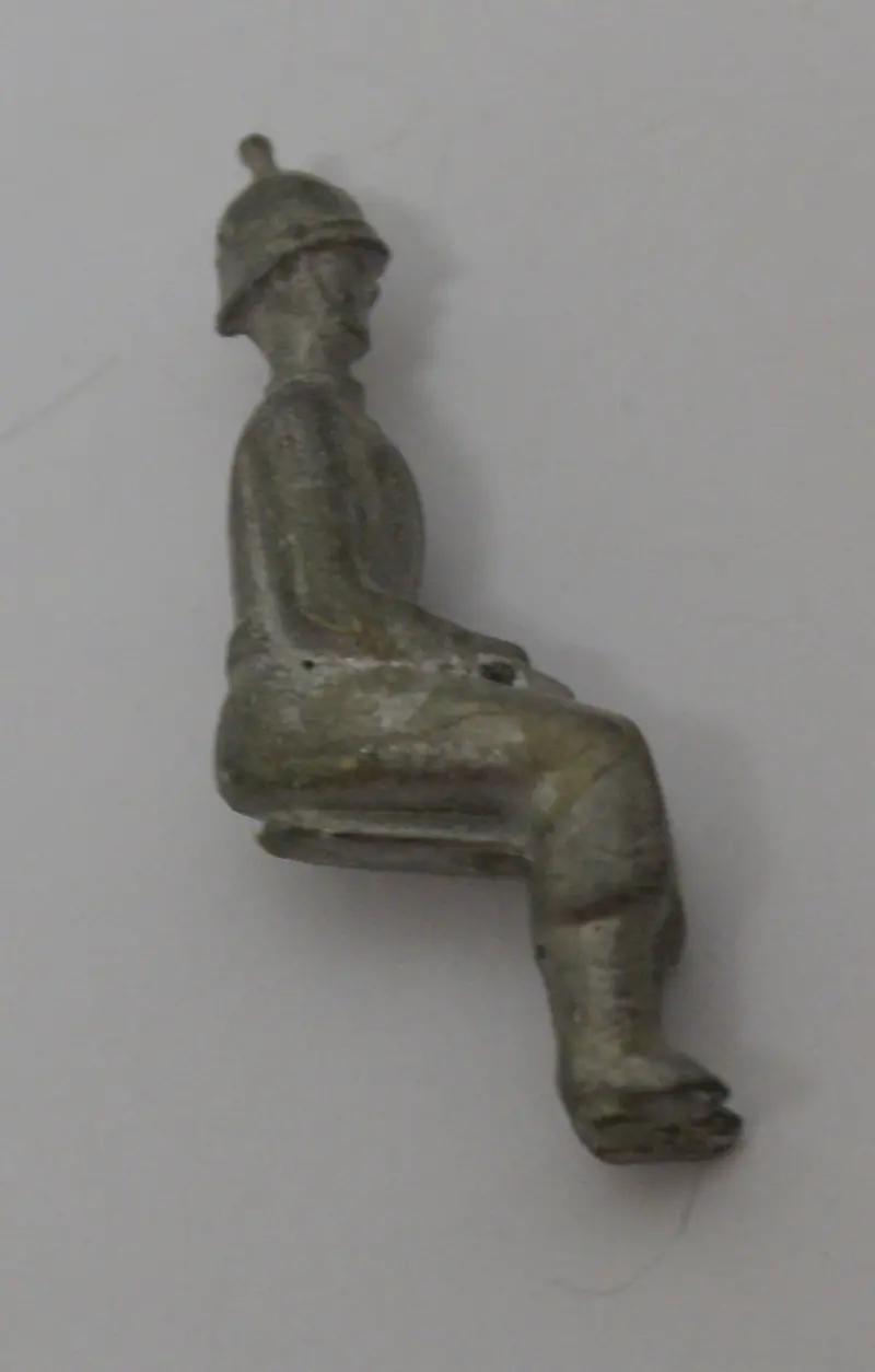 Britains Ltd Seated Fireman 1