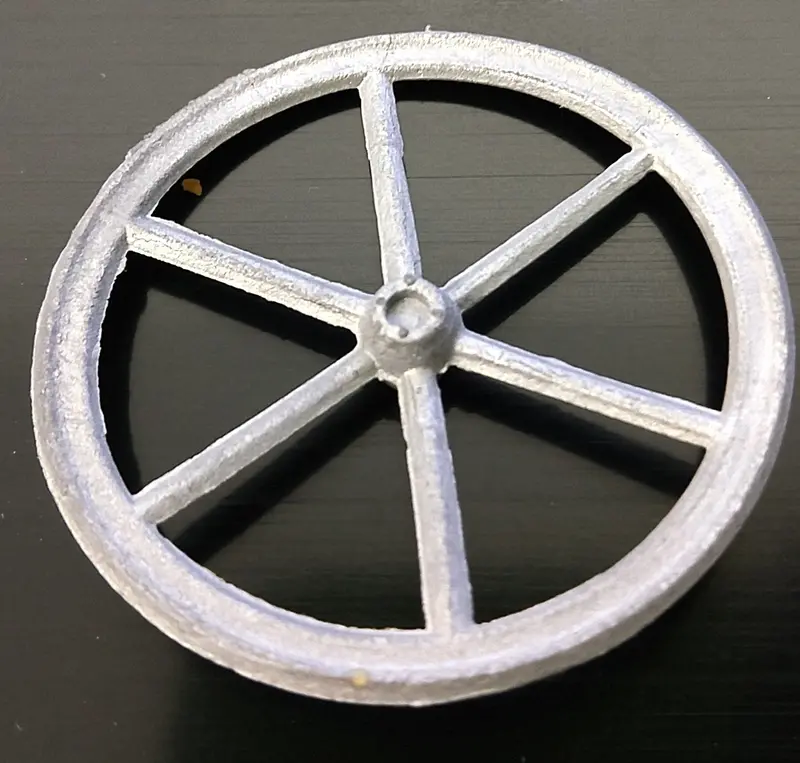 Cast 6 Spoke Narrow Wheel.  2-1/5" Diameter 1