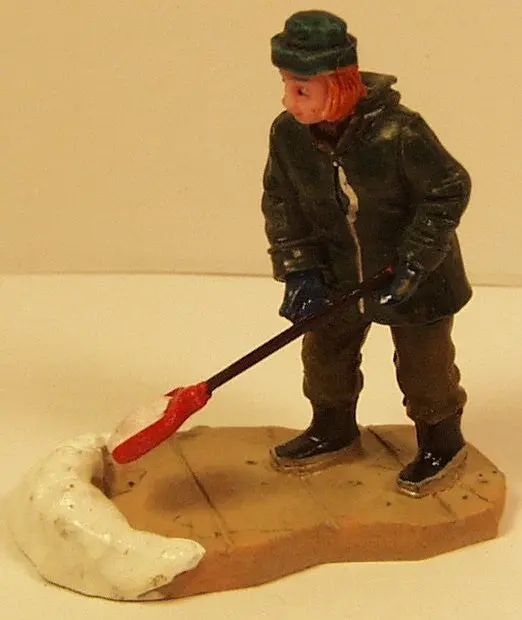 Lady Shoveling Snow B3229 2-1/2 In. Train Figure 1