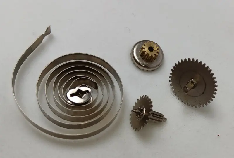 Lot Of Gears And Spring. 3 Pieces 1