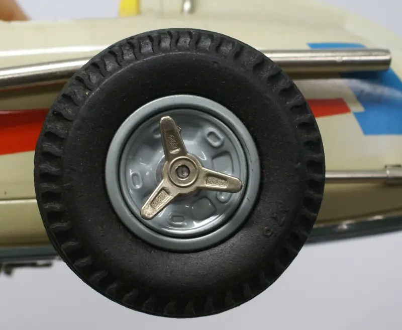 Sears Indy Racer Wheel Knock Offs. 1