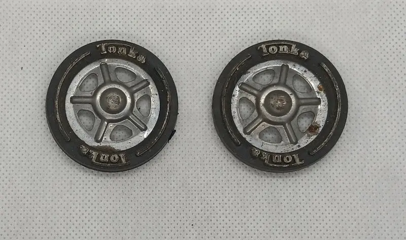 Set Of 2 Original Tonka 1970'S Hubs With Black Rims.  Original Condition 1