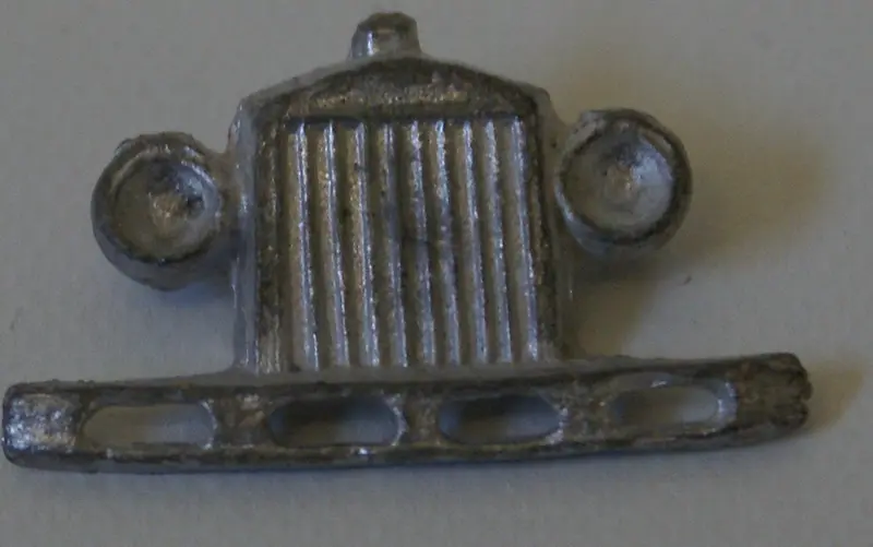 Tootsie Toy Diecast Headlight And Bumper. Grill Is 1-1/4" Height Is 6/8" 1