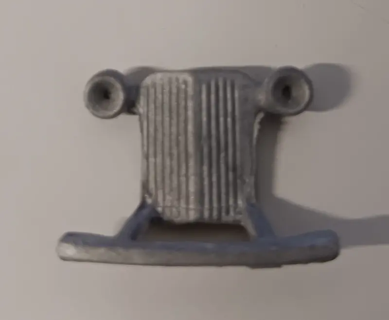 Tootsie Toy Grill : Small '34 Ford With Headlights Diecast 1