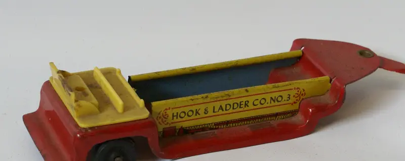 Toy Fire Truck Parts Toy.  Two 3/4" Black Wheels And Axle 1