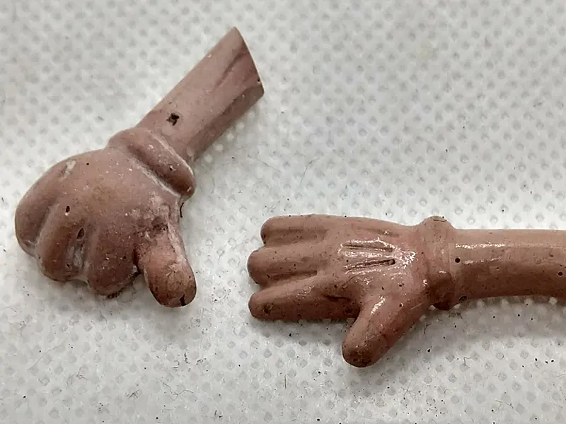 Two Composition Hands.  Disney Toy? 1