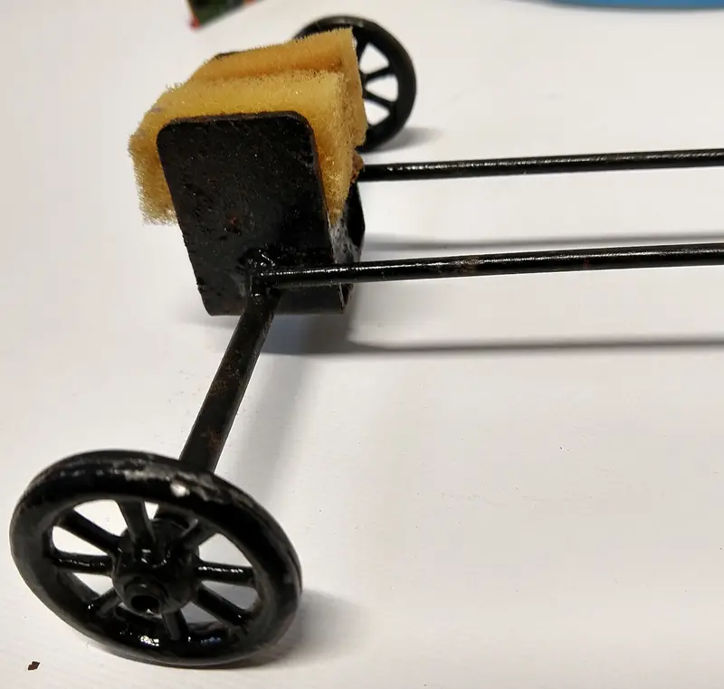 Vintage Tin Toy Boat Stand With Wheels. 1